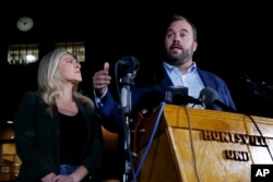 Texas state Representatives Lacey Hull, left, and John Bucy III comment during a press conference after the stay granted by the Texas Supreme Court to halt the execution of Robert Roberson, at the Huntsville Unit of the Texas State Penitentiary on Oct. 17, 2024.