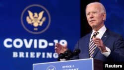 FILE - U.S. President-elect Joe Biden delivers remarks on the U.S. response to the coronavirus disease (COVID-19) outbreak, at his transition headquarters in Wilmington, Delaware, U.S., December 29, 2020. (REUTERS/Jonathan Ernst/File Photo)