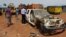Vehicles that have been stripped for parts during looting at the China International Fund depot in Bangui, March 4, 2014. (Nick Long/VOA)