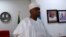 Nigeria's Senate President Bukola Saraki speaks in his office in Abuja, Nigeria, after senators defected from President Muhammadu Buhari's ruling All Progressives Congress, July 24, 2018.  