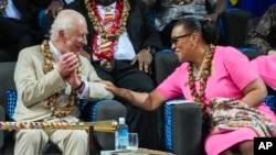 Britain's King Charles and CHOGM Secretary General Patricia Scotland talk during the opening ceremony for the Commonwealth Heads of Government meeting in Apia, Samoa, Oct. 25, 2024.