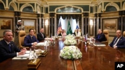 U.S., Saudi and Russian officials meet at Diriyah Palace, in Riyadh, Saudi Arabia, Feb. 18, 2025. Second left is U.S. Secretary of State Marco Rubio, with Russian Foreign Minister Sergey Lavrov at right. The talks were hosted by Saudi officials.