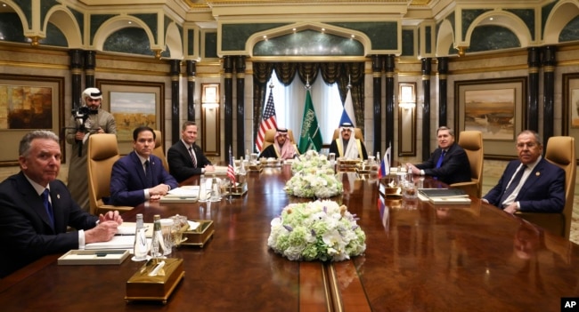 FILE - U.S., Saudi and Russian officials meet at Diriyah Palace, in Riyadh, Saudi Arabia, Feb. 18, 2025. Second left is U.S. Secretary of State Marco Rubio, with Russian Foreign Minister Sergey Lavrov at right. The talks were hosted by Saudi officials.