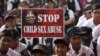 FILE - Indian schoolchildren participate in an awareness campaign rally to mark World Day for the Prevention of Child Abuse and Violence against Children, in Hyderabad, India, Nov. 19, 2014. 