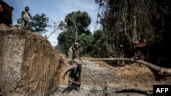 Baluki makele na mine ya Togo-Kazaroho, na Ituri, 11 juillet 2018.