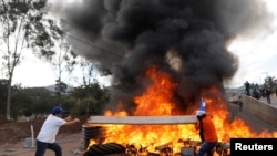 Des émeutes lors de l’investiture du président Juan Orlando Hernandez après sa re-élection à Tegucigalpa le 27 janv. 2018.