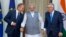 Indian Prime Minister Narendra Modi (C) talks with European Council President Donald Tusk (L), and European Commission President Jean-Claude Juncker before their meeting in New Delhi, Oct. 6, 2017.