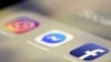 ARCHIVO- Los iconos de las aplicaciones Facebook, Messenger e Instagram se muestran en un iPhone el 13 de marzo de 2019 en Nueva York.