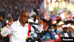 FILE: Adalberto Costa Junior, leader of Angola's main opposition party UNITA, addresses his supporters during the party's final rally at Cazenga, outside the capital Luanda. Taken 8.22.2022