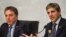 FILE - Argentine Central Bank President Luis Caputo speaks as Argentine Treasury Minister Nicolas Dujovne looks on during a press conference at the G20 meeting of Finance Ministers and Central Bank governors in Buenos Aires, Argentina, July 22, 2018. 