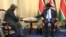 FILE - South Sudan's President Salva Kiir sits with ex-vice president and former rebel leader Riek Machar before their meeting in Juba, South Sudan, Sept. 11, 2019.
