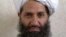 FILE - Afghan leader Hibatullah Akhundzada is pictured in this undated photo, taken in an unknown location. From appointing ministers and judges to selecting district administrators, Akhundzada decides everything in the Taliban regime.