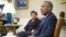 Attorney General Loretta Lynch listens as President Barack Obama speaks in the Oval Office of the White House in Washington, Jan. 4, 2016, during a meeting with law enforcement officials to discuss executive actions the president can take to curb gun violence.