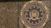 FILE - The seal on the J. Edgar Hoover FBI Building is seen June 9, 2023, in Washington. 