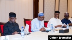 Shugaba Mohammadu Buhari da mataimakinsa 