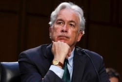 FILE - CIA Director William Burns listens during a Senate Select Committee on Intelligence hearing about worldwide threats, on Capitol Hill in Washington, April 14, 2021.