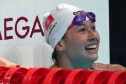 Siobhan Bernadette Haughey of Hong Kong smiles after the women's 200-meter freestyle final at the 2020 Summer Olympics, July 28, 2021, in Tokyo, Japan.
