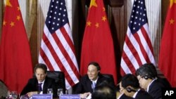 U.S. Treasury Secretary Timothy Geithner, China's Vice Premier Wang Qishan, May 2011 (file photo).