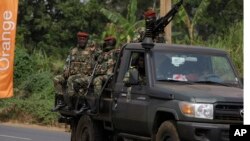 Soldiers patrol outside the entrance of Bafoussam stadium, Bafoussam, Cameroon, Jan. 14, 2022. 