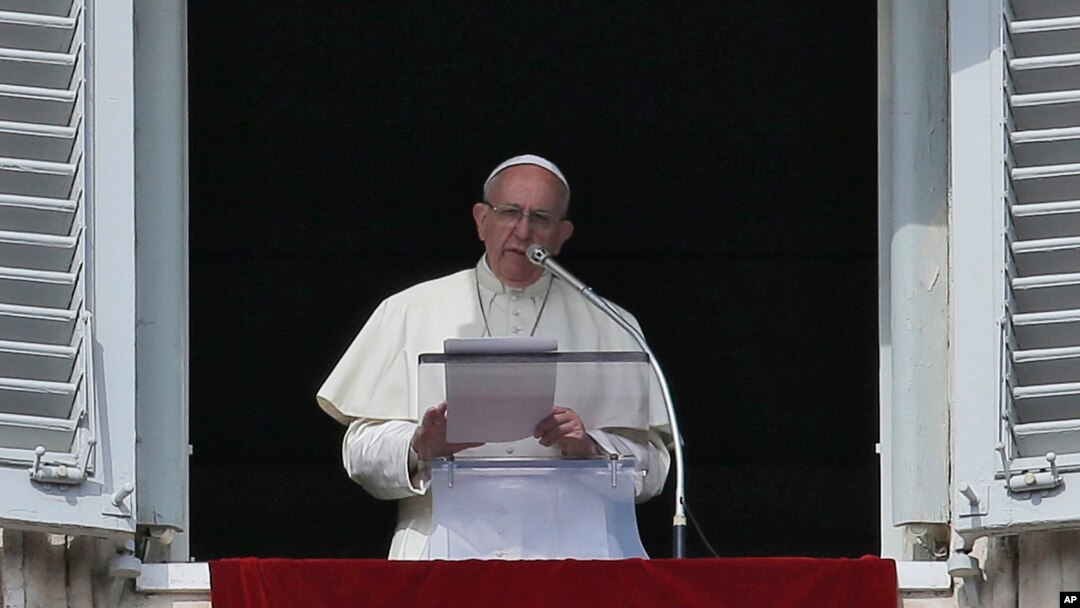 Pope Francis delivers a message from his studio window overlooking St. Peter's Square on the occasion of hishe Angelus noon prayer, at the Vatican, Feb. 21, 2016.