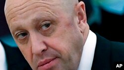 FILE: Russian owner of war-crimes-accused mercenary "Wagner Group" Yevgeny Prigozhin is shown in the Kremlin in Moscow, Russia, July 4, 2017