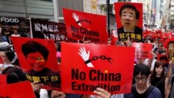 VOA Asia - Hong Kong businesses pay the price