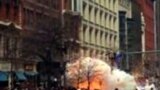 In this image from video provided by WBZ TV, spectators and runners run from what was described as twin explosions that shook the finish line of the Boston Marathon, April 15, 2013. 