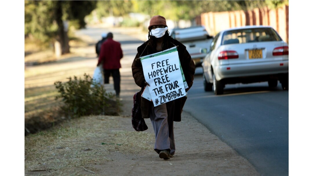 Zimbabwean writer and filmaker Tsitsi Dangarembwa demonstrates outside the house of Hopewell Chin'onos Harare, July 20, 2020.