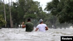 Kota Mandeville di negara bagian Louisiana, AS, dilanda banjir pasca dilanda badai tropis Barry yang mengguyurkan hujan lebat sepanjang akhir pekan ini (13/7).