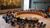 FILE - Members of the U.N. Security Council gather inside the United Nations Security Council chambers for a meeting on Syria, April 30, 2019.