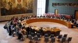 Members of the U.N. Security Council gather inside the United Nations Security Council chambers for a meeting on Syria, April 30, 2019.