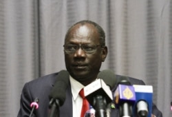 FILE - Michael Makuei, South Sudanese information minister, attends a press conference in Addis Ababa, Jan. 5, 2014.