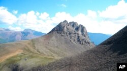 This undated photo provided by Elizabeth Turner, Laurentian University, shows a field location in Northwest Territories, Canada. Turner may have found the earliest fossil record of animal life on Earth in the area shown, a published report says.