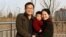 维权律师王全璋在“被消失”前与妻子李文足和孩子的合影。(资料照片)