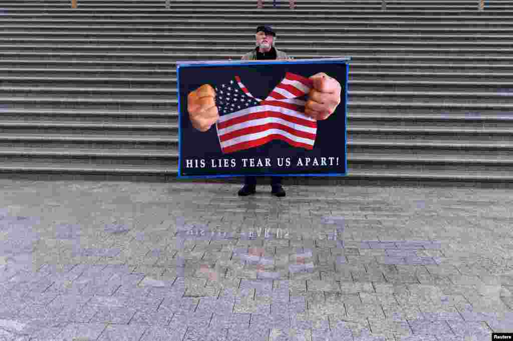 Stephen Parlato of Colorado protests outside the U.S. Capitol in Washington, D.C.