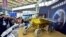 Prototipo del explorador lunar chino, en la Feria Industrial de Shangai. Un vehículo similar tiene problemas mecánicos en la supeficie de la luna.