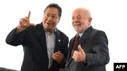 ARCHIVO - Los presidentes de Bolivia, Luis Arce, a la izquierda, y de Brasil, Luiz Inacio Lula da Silva, durante una reunión bilateral en Brasilia el 2 de enero de 2023.