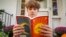 Chris Stanislawski, 14, of Garden City, N.Y., didn't finish any books in his 8th grade English class, in part because their google classroom had detailed summaries of each chapter of every book. (AP Photo/Brittainy Newman)