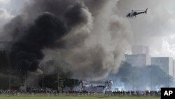 Aksi protes anti-pemerintah yang berakhir rusuh di Brasilia, Brazil hari Rabu (24/5). 