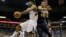 FILE - Minnesota Timberwolves center Ronny Turiaf (L) of France, pulls down a rebound against Utah Jazz center Derrick Favors (15) during the second quarter of an NBA basketball game in Minneapolis.