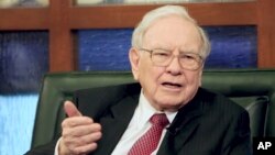 FILE - Berkshire Hathaway Chairman and CEO Warren Buffett speaks during an interview with Liz Claman on the Fox Business Network in Omaha, Neb.