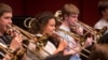 Trombonist Skye Dearborn (center), a member of the 2013 National Youth Orchestra of the United States of America rehearses at SUNY Purchase. (Photo courtesy Chris Lee)