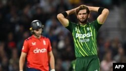 Pakistan's Shaheen Shah Afridi (R) reacts while bowling during the fourth T20 international cricket match between England and Pakistan at The Oval, in London on May 30, 2024. (Photo by Glyn KIRK / AFP) / RESTRICTED TO EDITORIAL USE. NO ASSOCIATION WITH DI