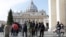 Tourists are inspected as they enter the Vatican in Rome, Italy, Nov. 22, 2015. Rome is bracing for the arrival of millions of pilgrims for the Roman Catholic Holy Year which officials had hoped could revitalize the scandal-plagued city, but which threatens to be more of a headache than a help.