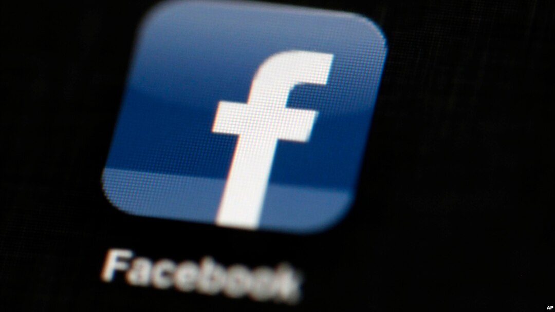 FILE - Тhe Facebook logo is displayed on an iPad Nov. 2, 2016.
