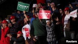 FILE - Supporters react at U.S. President Donald Trump's campaign rally in Battle Creek, Mich., Dec. 18, 2019. 