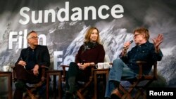 Sundance Film Festival director John Cooper (L-R), executive director Keri Putnam and founder Robert Redford address the media at an opening day news conference for the festival at the Egyptian Theatre in Park City, Utah, Jan. 22, 2015. 