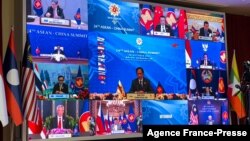 Sultan of Brunei Hassanal Bolkiah (C) takes part in the ASEAN-China Summit on the sidelines of the 2021 Association of Southeast Asian Nations (ASEAN) summits held online on a live video conference in Bandar Seri Begawan, Brunei, Oct. 26, 2021. 