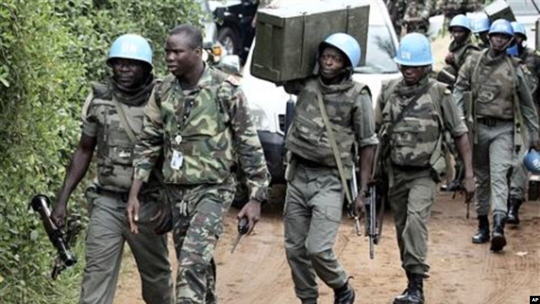 UN troops patrol in Abidjan, Ivory Coast, 12 Dec 2010