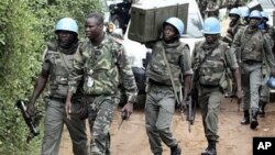 UN troops patrol in Abidjan, Ivory Coast, 12 Dec 2010